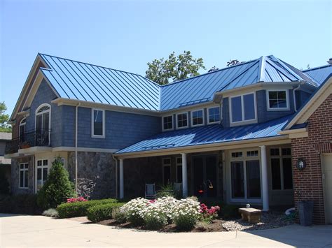 caribbean style house blue metal roof|blue roof house.